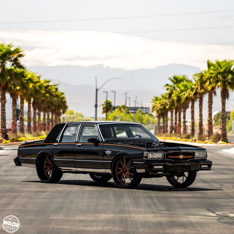 Chevy Caprice on Savini SV68XC in Gloss Black with Orange Accents