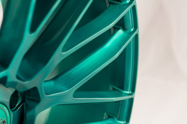 Brushed Teal finish on a Savini forged wheel