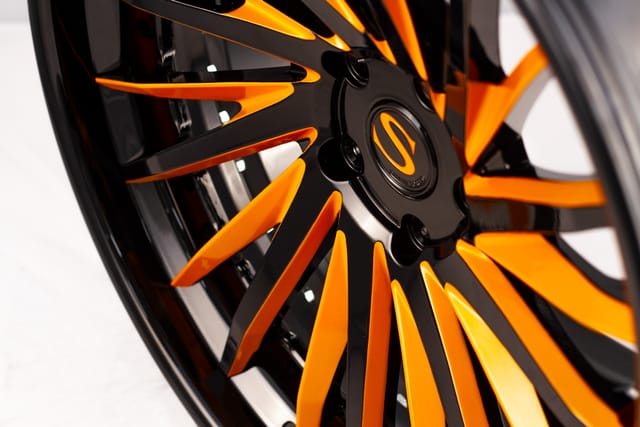 Gloss Black Orange Accent finish on the Savini SV64 L forged wheel